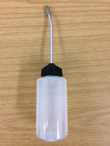 P010 Plastic Oil bottle with metal spout